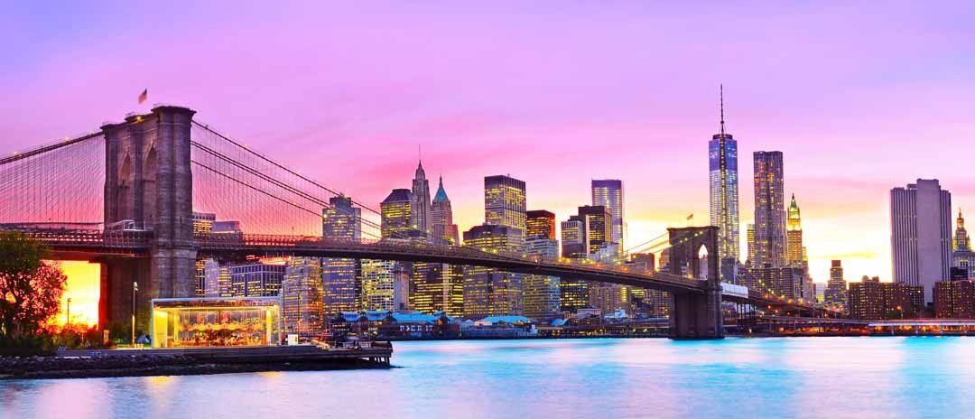 New York City mural with Brooklyn Bridge at dusk, ideal for indoor and outdoor spaces.