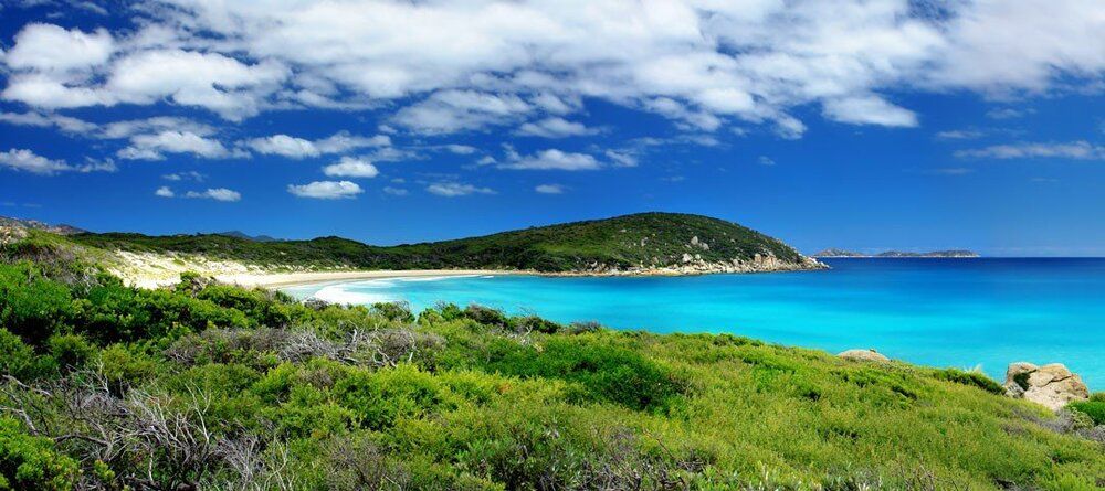 Twilight Beach mural with turquoise waters and pristine sands, ideal for indoor and outdoor spaces.