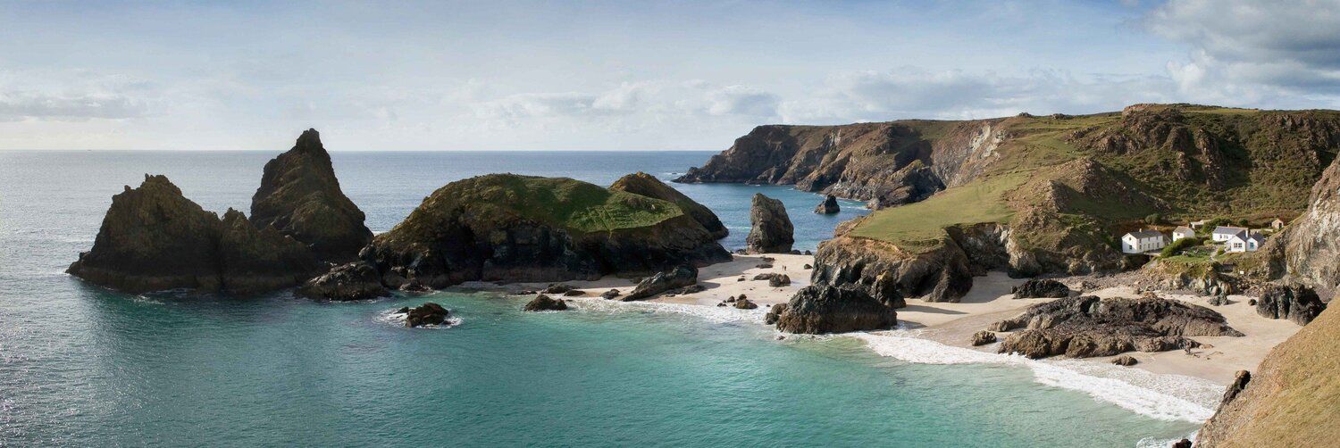 Kynance Cove mural with turquoise waters and cliffs, perfect for indoor and outdoor spaces.