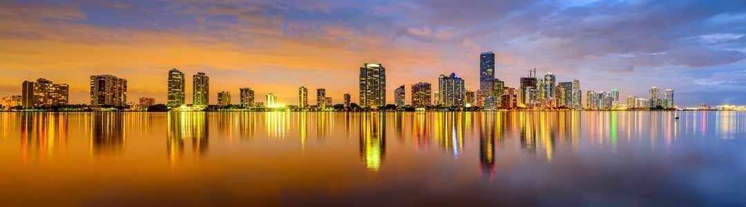 Miami skyline mural at sunset with vibrant hues, ideal for indoor and outdoor spaces.