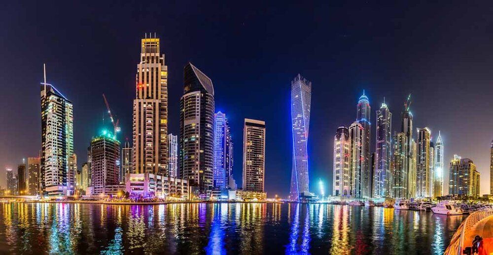 Dubai Marina night mural with neon-lit skyline, ideal for indoor and outdoor spaces.