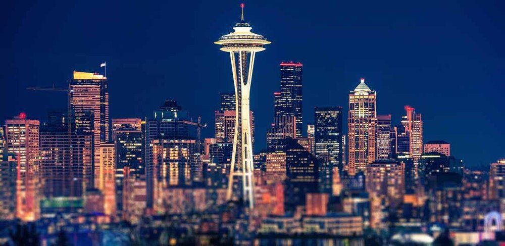 Space Needle at night with Seattle cityscape mural, perfect for indoor and outdoor spaces.