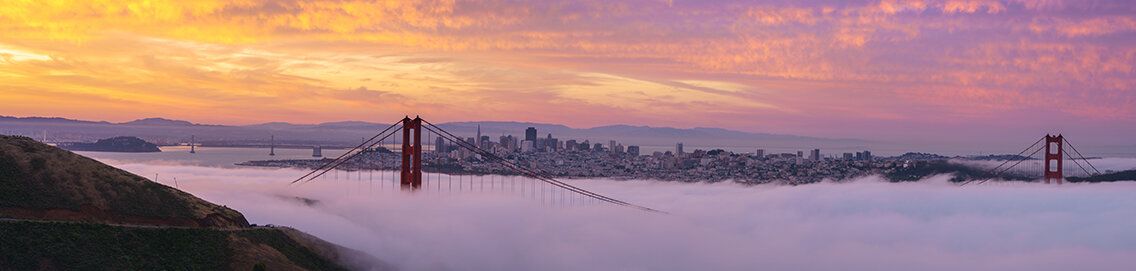 Golden Gate Bridge mural with fog and sunrise, perfect for indoor and outdoor spaces.