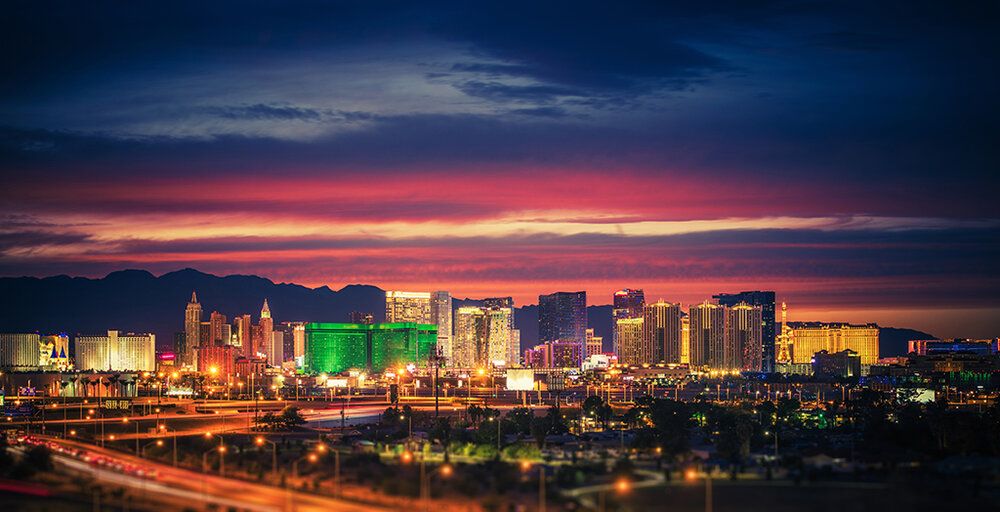 Las Vegas skyline mural with sunset and city lights, perfect for indoor and outdoor spaces.
