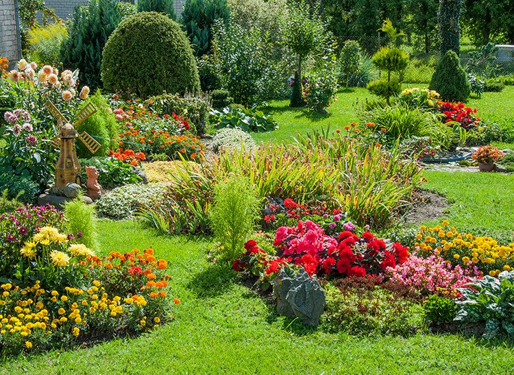 Blooming flower garden mural with seasonal flowers, perfect for indoor and outdoor spaces.