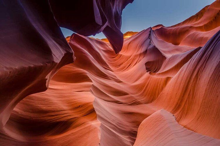 Antelope Canyon mural at dusk with red rocks and darkening sky, ideal for indoor and outdoor spaces.