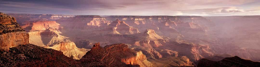 Grand Canyon mural with morning haze, ideal for creating warmth in indoor and outdoor spaces.