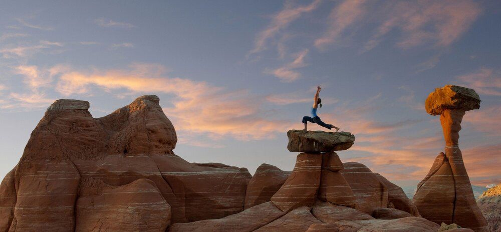 Yoga practice on Utah rock formation mural, perfect for enhancing indoor and outdoor spaces.