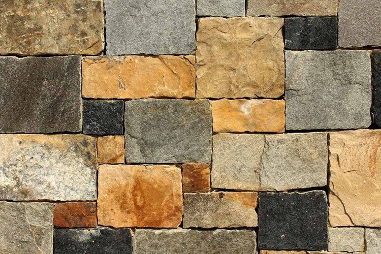 Blocky stone wall mural, ideal for adding rustic charm to indoor or outdoor spaces.