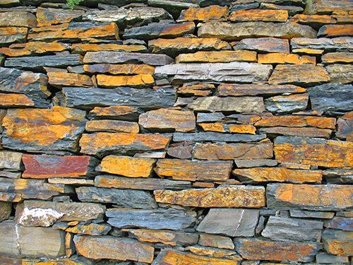 Stone wall texture mural, ideal for adding rustic charm to indoor or outdoor spaces.